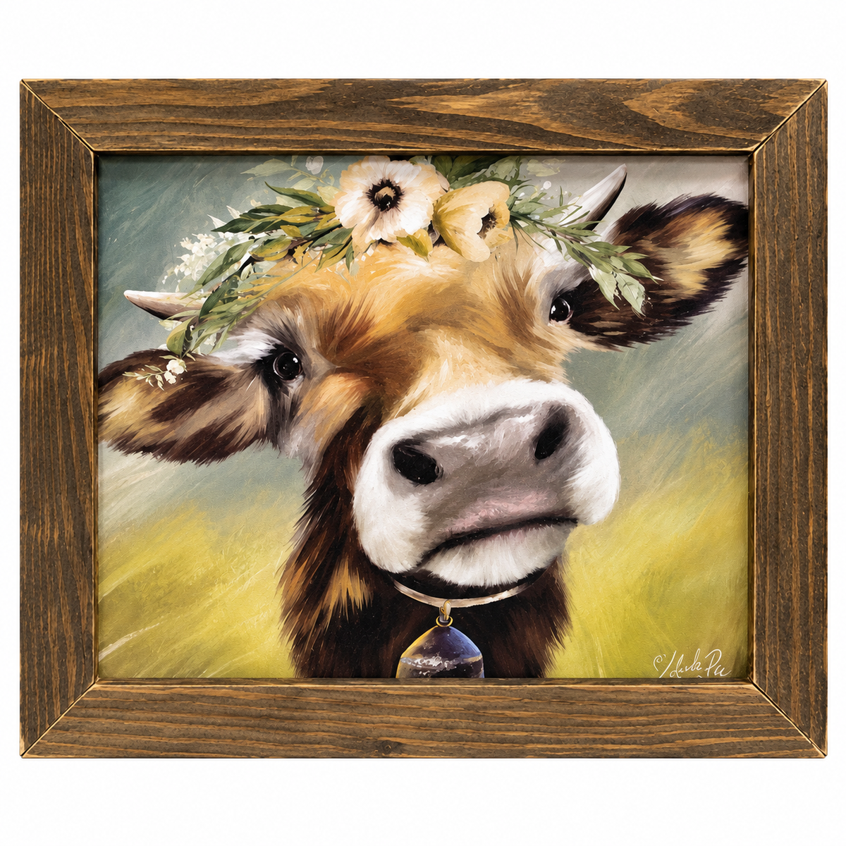 A framed painting of a close-up cow with a flower crown and bell, set in a rustic brown wooden frame against a white background.