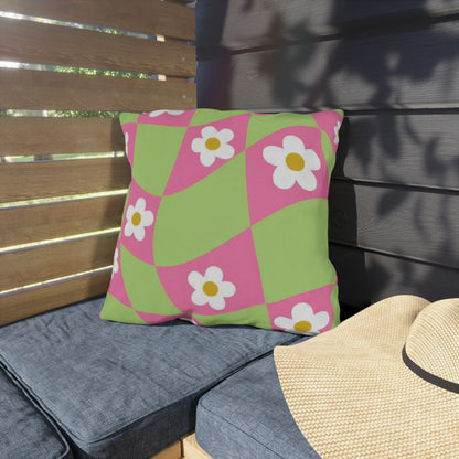 Vibrant polyester cushion with orange and white floral design for outdoor furniture