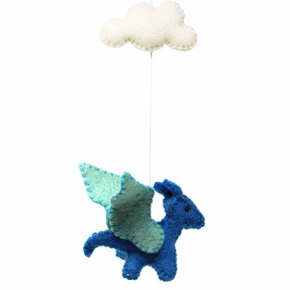 Nepalese artisan making a handcrafted felt dragon mobile, sustainable baby decor, eco-conscious nursery accessory.