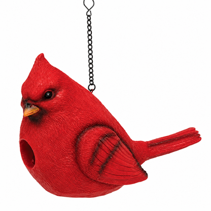 A red cardinal bird hanging ornament or bird feeder with a textured finish, featuring a black hanging chain, on a solid white background.