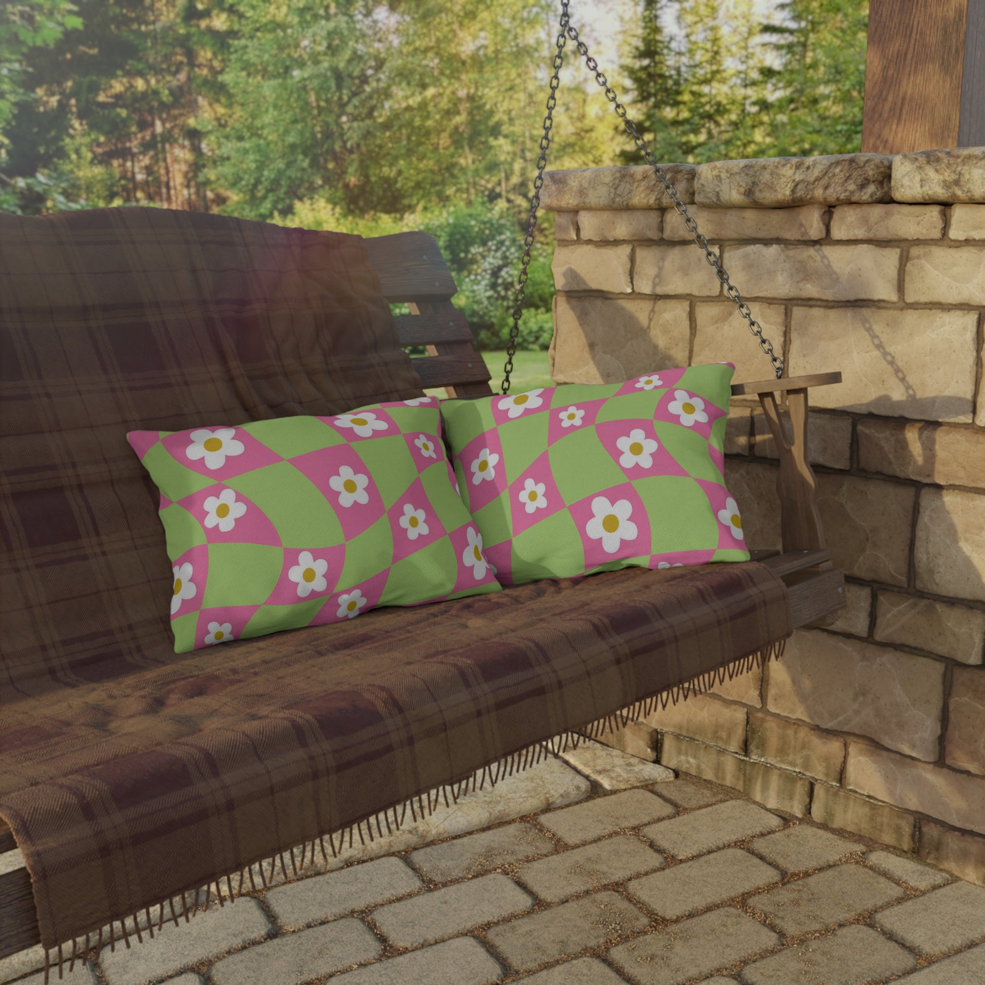 Decorative lumbar pillow styled with blooming floral print and water-resistant material