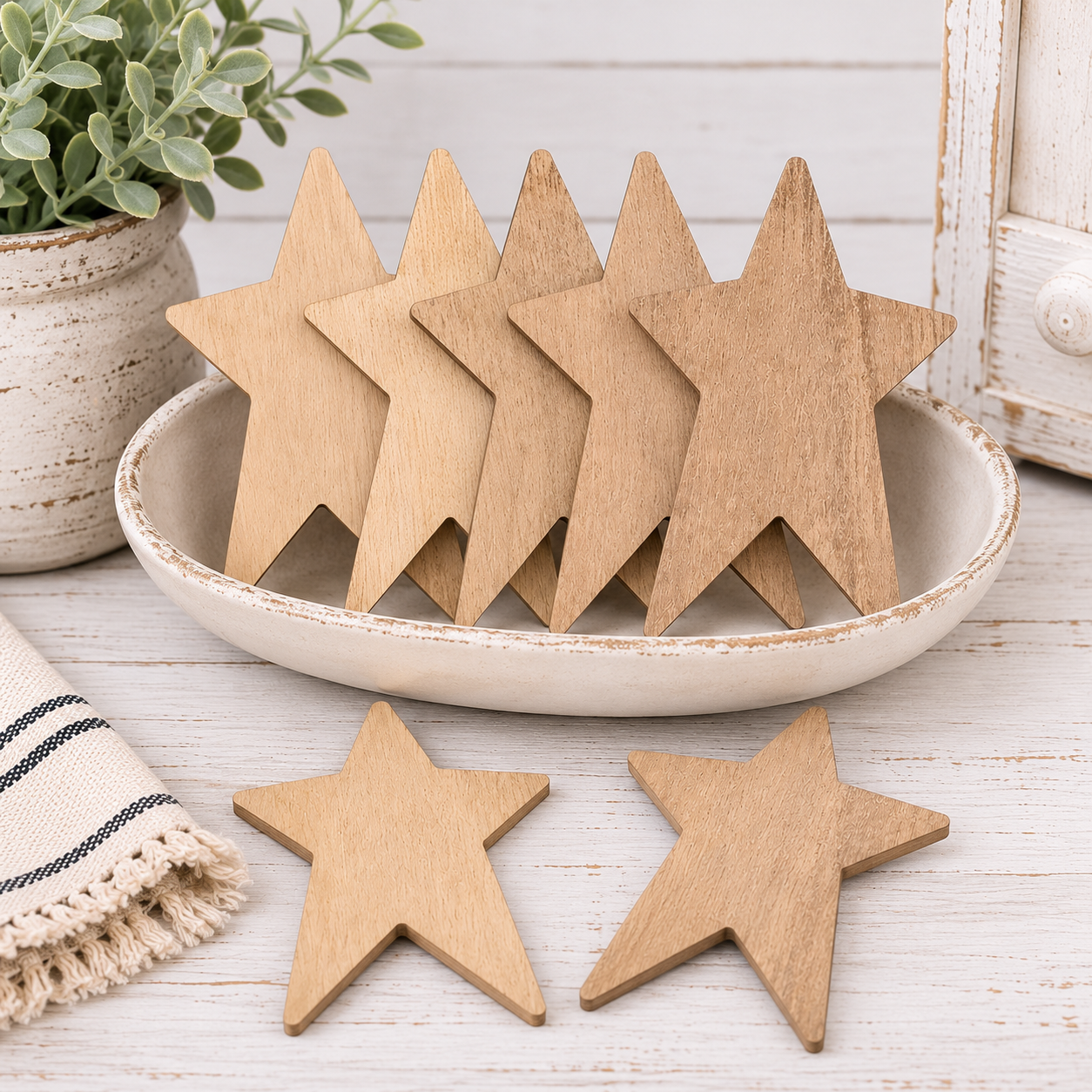 Set of six unfinished 4.5 inch primitive wooden stars with natural wood grain for farmhouse decor and DIY craft projects