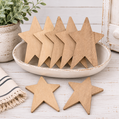 Set of six unfinished 4.5 inch primitive wooden stars with natural wood grain for farmhouse decor and DIY craft projects
