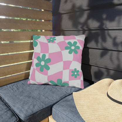 Decorative pillow with blooming floral design made for outdoor relaxation.