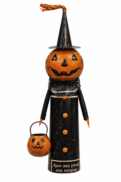 A Halloween decorative figure shaped like a witch's hat and black dress with orange pumpkin face details, holding a small orange jack-o'-lantern bucket against a plain white background.