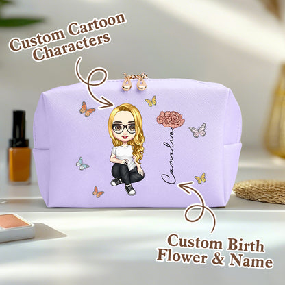 A purple personalized makeup bag on a table, featuring a custom cartoon character, birth flower, and name, with an overlay saying custom cartoon characters and custom birth flower and name.