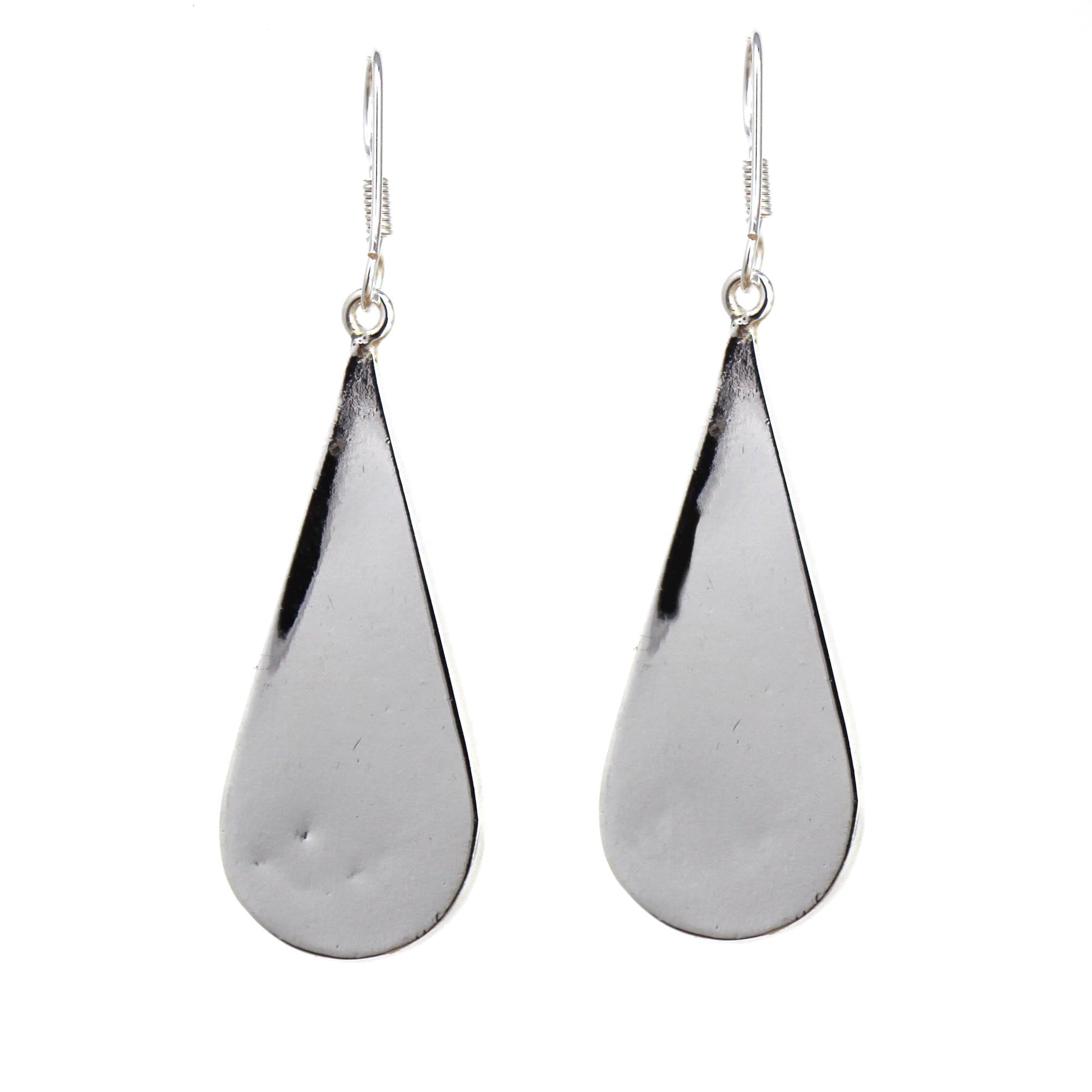 Fair Trade dangle earrings featuring natural shell and silver-tone metal.