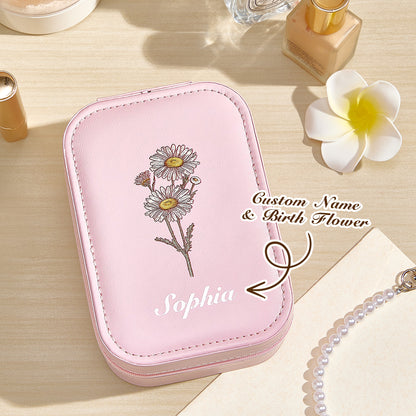 A top view of the pink personalized jewelry box, with a text overlay indicating that the name and birth flower are customizable, showcasing the elegant design and LED mirror.