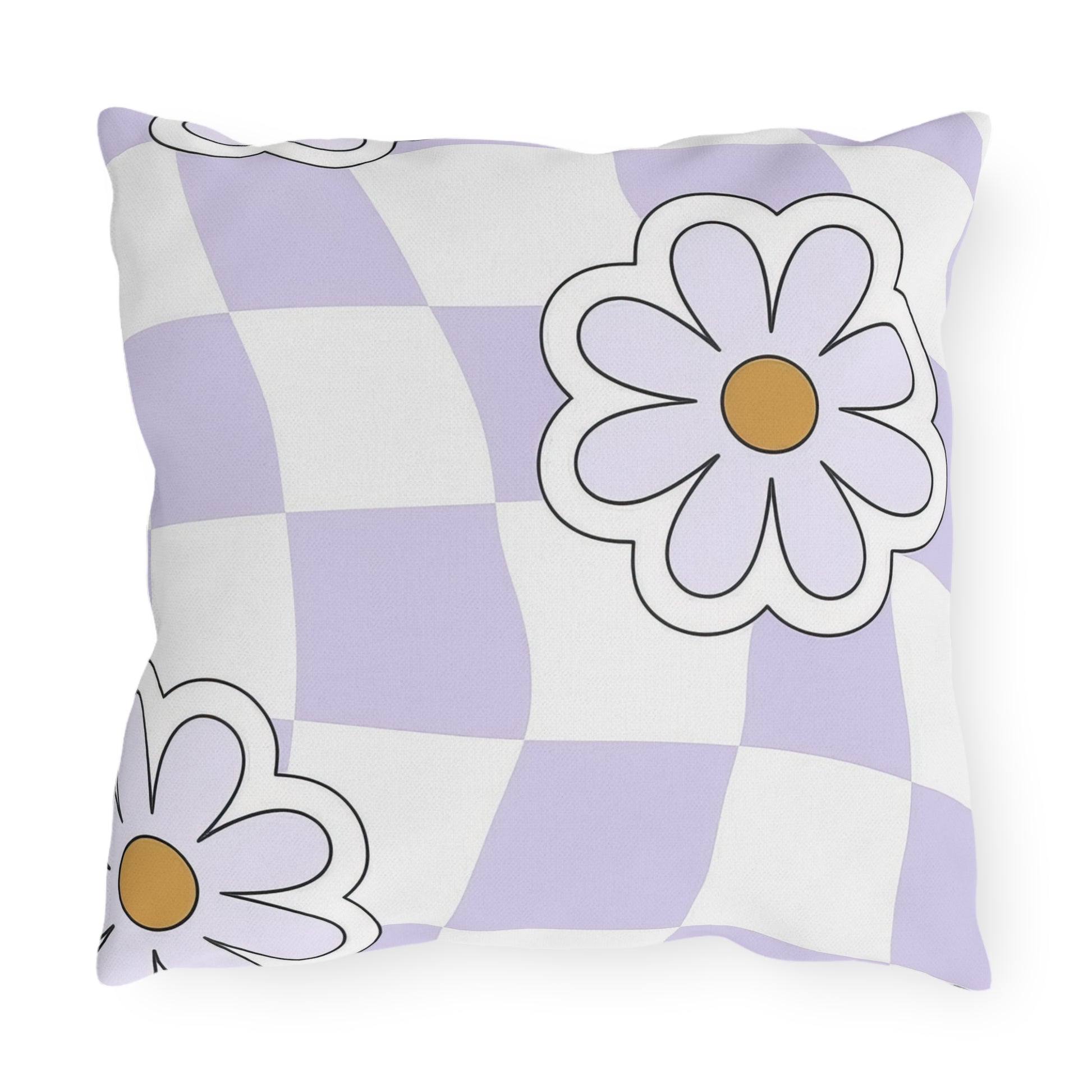 Outdoor throw pillow with floral pattern displayed on wooden deck seating