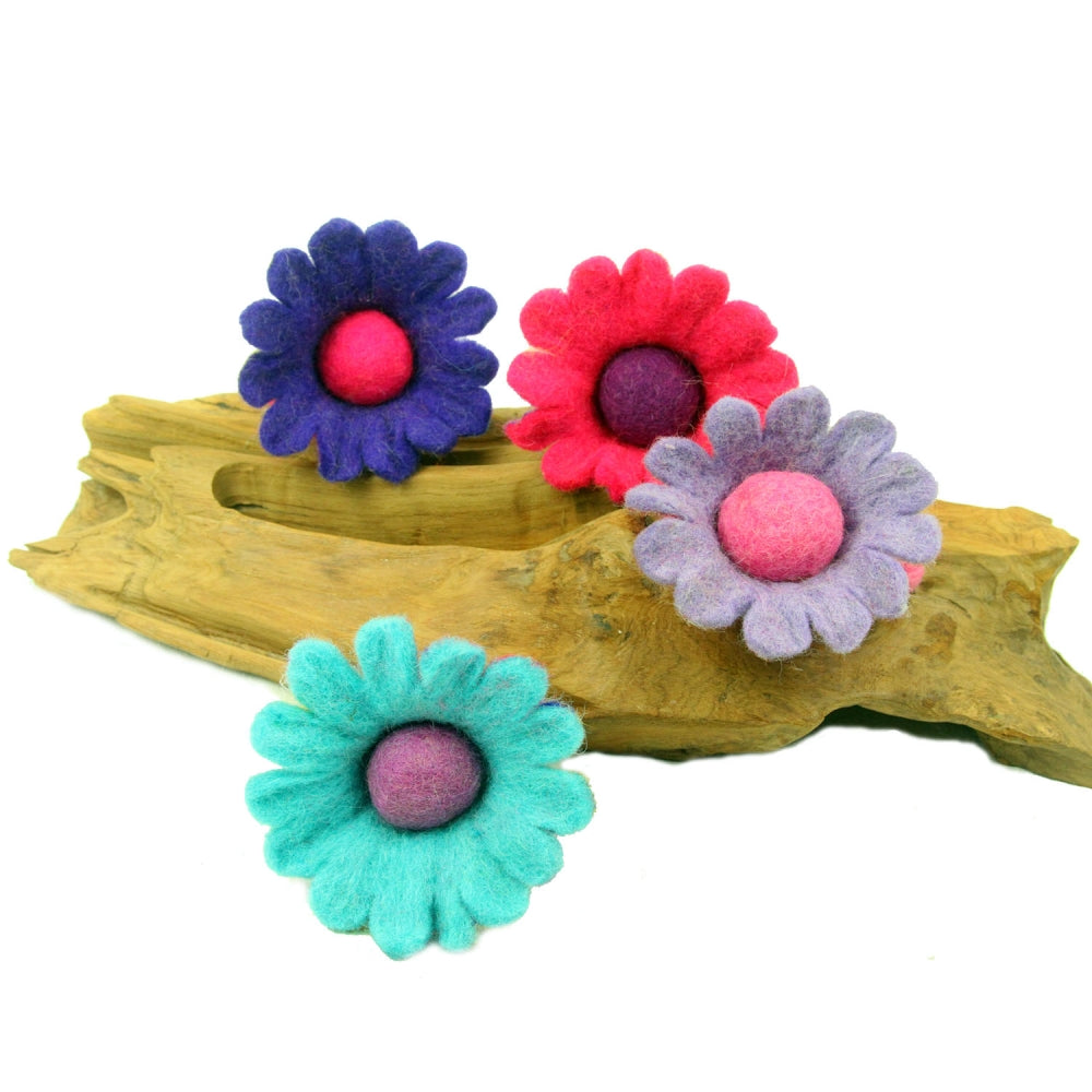 Close-up of handcrafted felt fairy figurines made with soft wool and eco-friendly materials