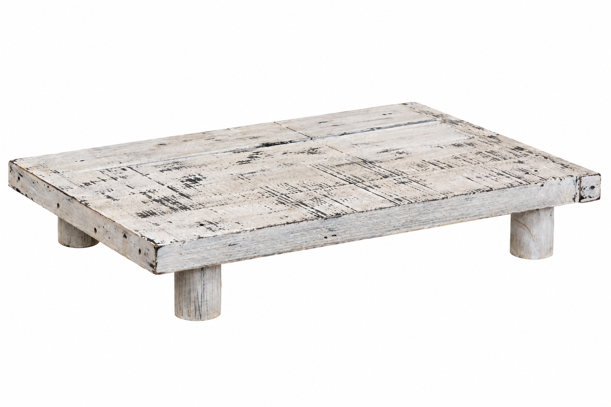 A rustic rectangular wooden coffee table with a distressed white and gray finish, featuring four short cylindrical legs, shown on a plain white background.