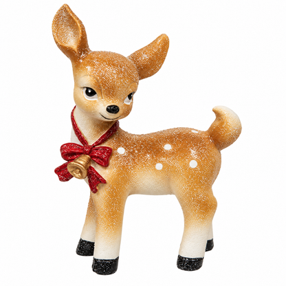 A decorative fawn figurine with a white speckled winter finish, featuring a red glittery bow and bell around its neck, set against a plain white background.