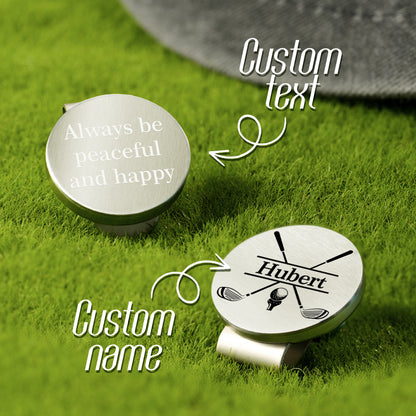 Two personalized golf ball markers with a magnetic hat clip, featuring custom text and a name. Made from sleek zinc alloy, designed for easy access on the course.