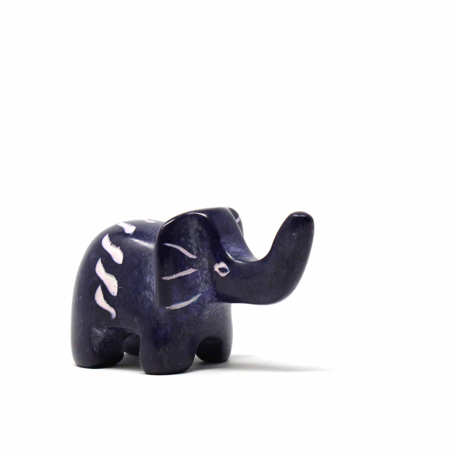 Fair Trade hand-carved soapstone elephants, small in size but rich in cultural craftsmanship and heritage.