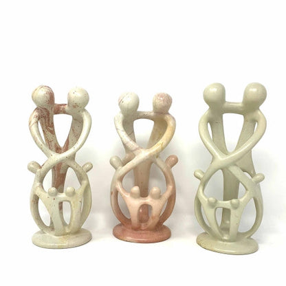 African soapstone family statue, symbolizing love, unity, and connection, carved from a single piece of stone in Kenya’s Tabaka region.