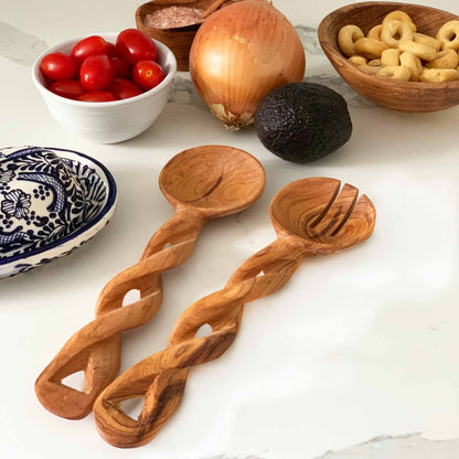 Hand-carved olive wood salad serving set with braided handles, crafted in Kenya.