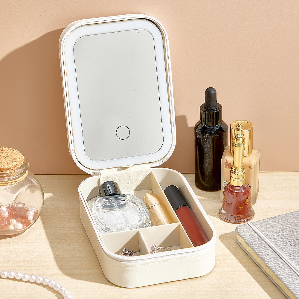 A view of the white version of the personalized jewelry box, showing it being used as a makeup travel case, with the mirror closed and the compact design highlighting its versatility for travel.