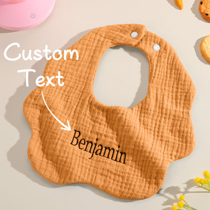 Brown personalized baby bib with custom text overlay, adding a personal touch to baby’s essentials. Great for newborns, birthdays, and baby showers.