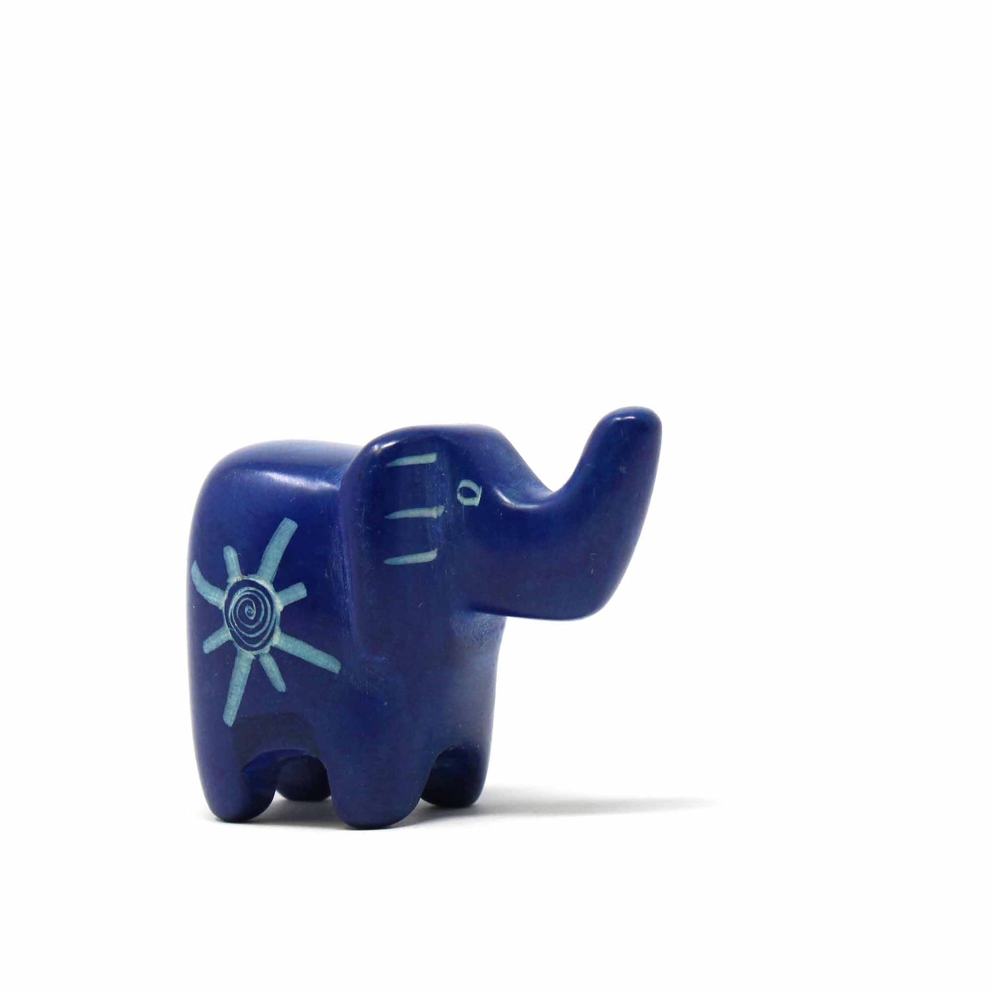 Vibrant soapstone elephant carvings, each uniquely shaped and colored, making them a one-of-a-kind decorative set.