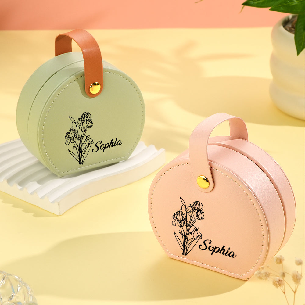 A personalized birth flower jewelry box with a soft PU leather exterior, delicate floral design, and secure closure for keeping rings, necklaces, and earrings safe.