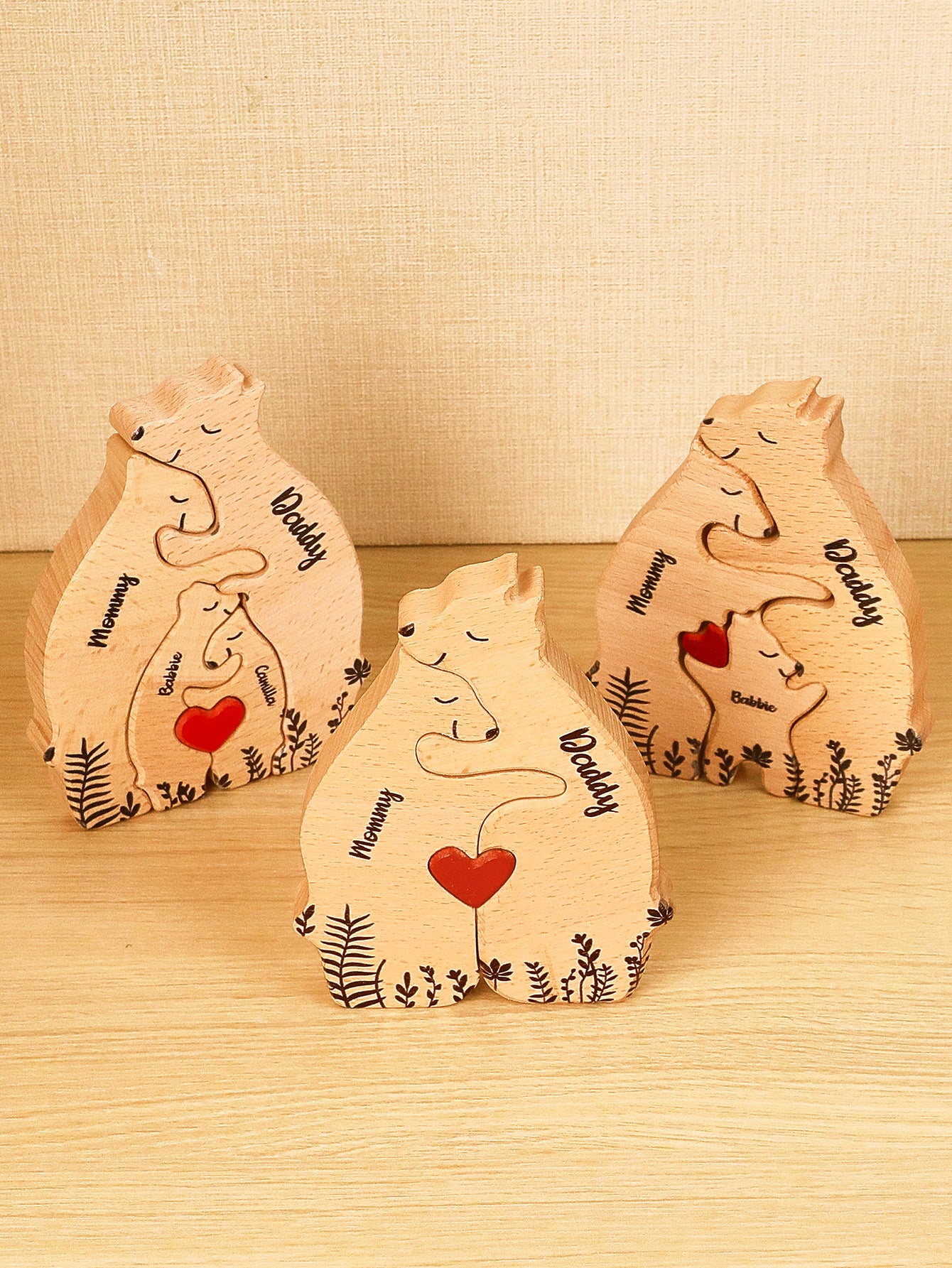 Set of custom wooden bear puzzles with 4, 3, and 2 bears, personalized with family names. A perfect family gift for anniversaries and memorable moments.