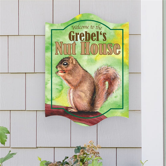 Funny personalized “Welcome to the Nut House” wall sign with family name