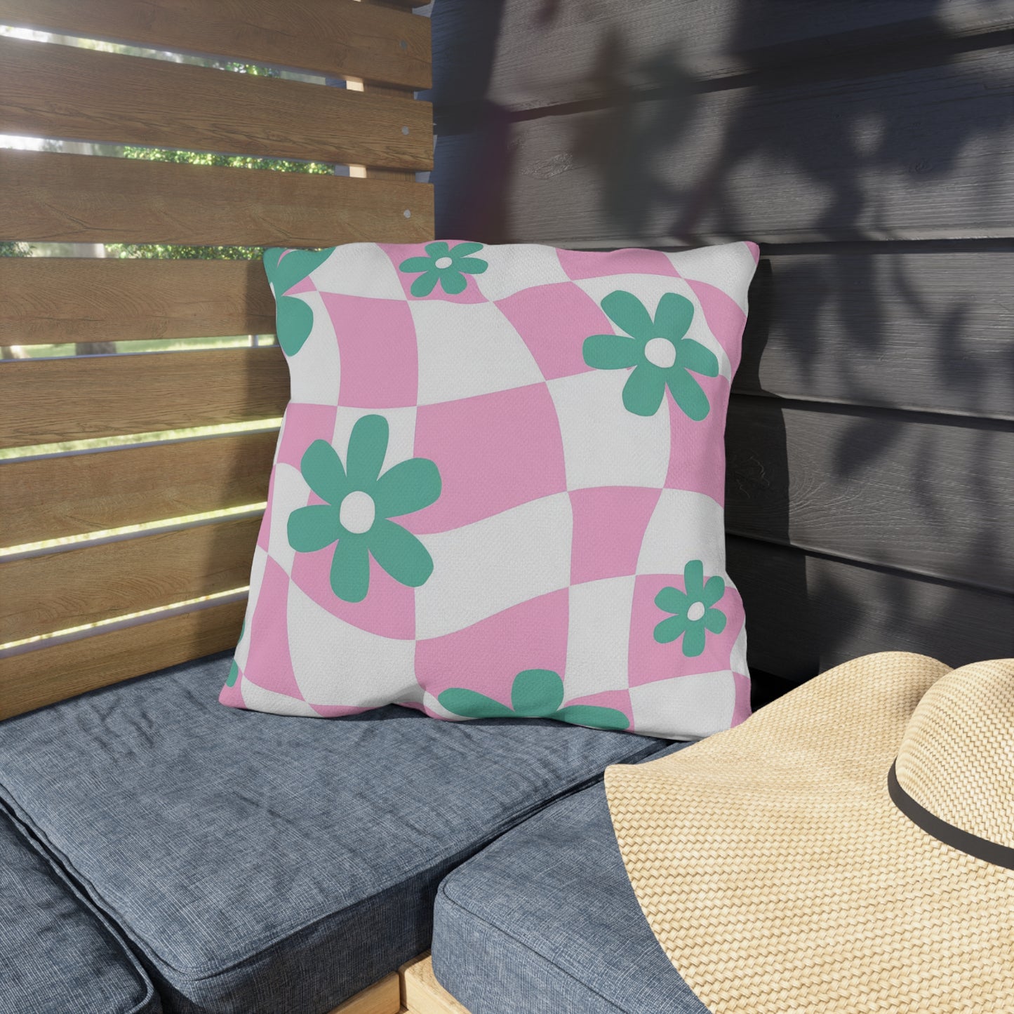 Cozy outdoor pillow crafted from durable spun polyester for garden seating.