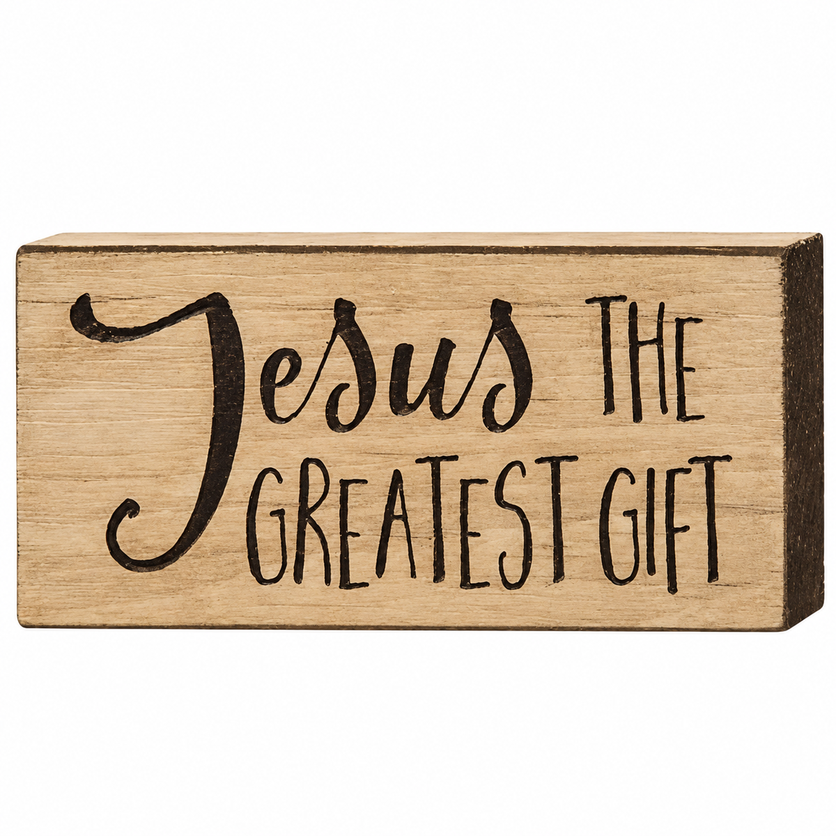 A rectangular wooden decorative block with the phrase 'Jesus THE GREATEST GIFT' in black lettering, shown on a plain white background.