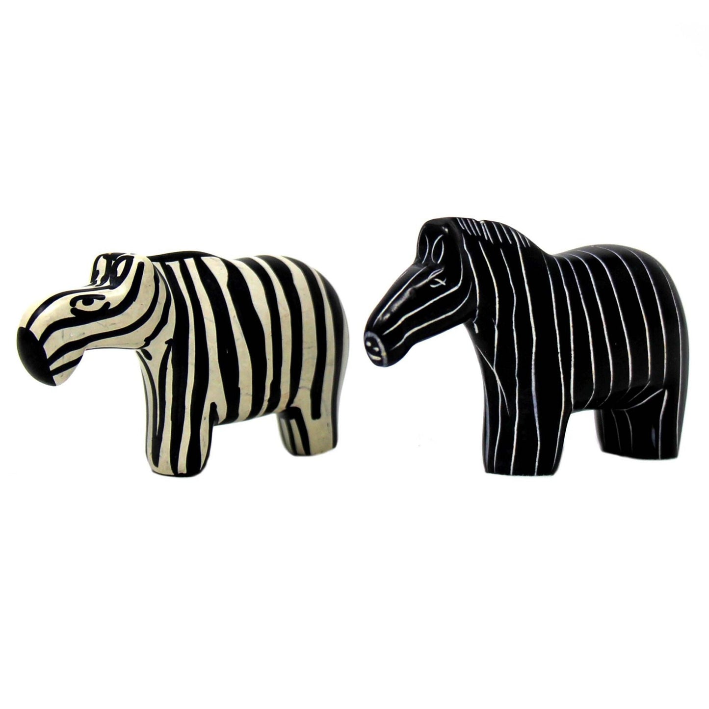 Hand-carved soapstone zebra sculptures in black and natural tones