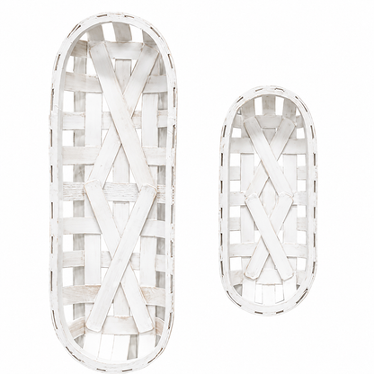 Two white woven basket-style wall baskets in oval shapes, shown on a plain white background.