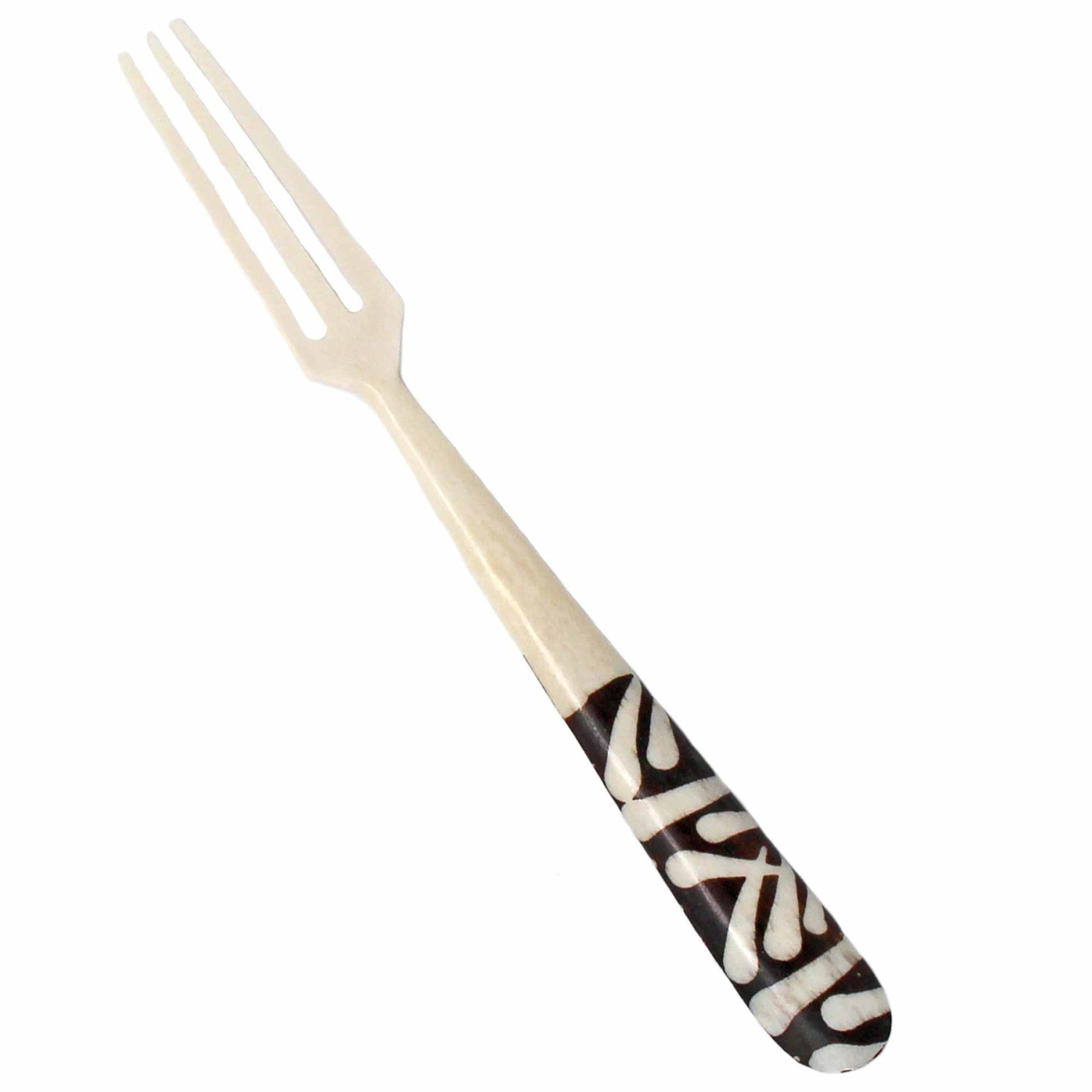 Close-up of intricate batik patterns on appetizer forks