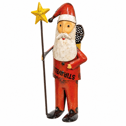 A whimsical Santa Claus figurine with a yellow star-topped staff, holding a black-and-white polka-dot tennis racket, on a plain white background.