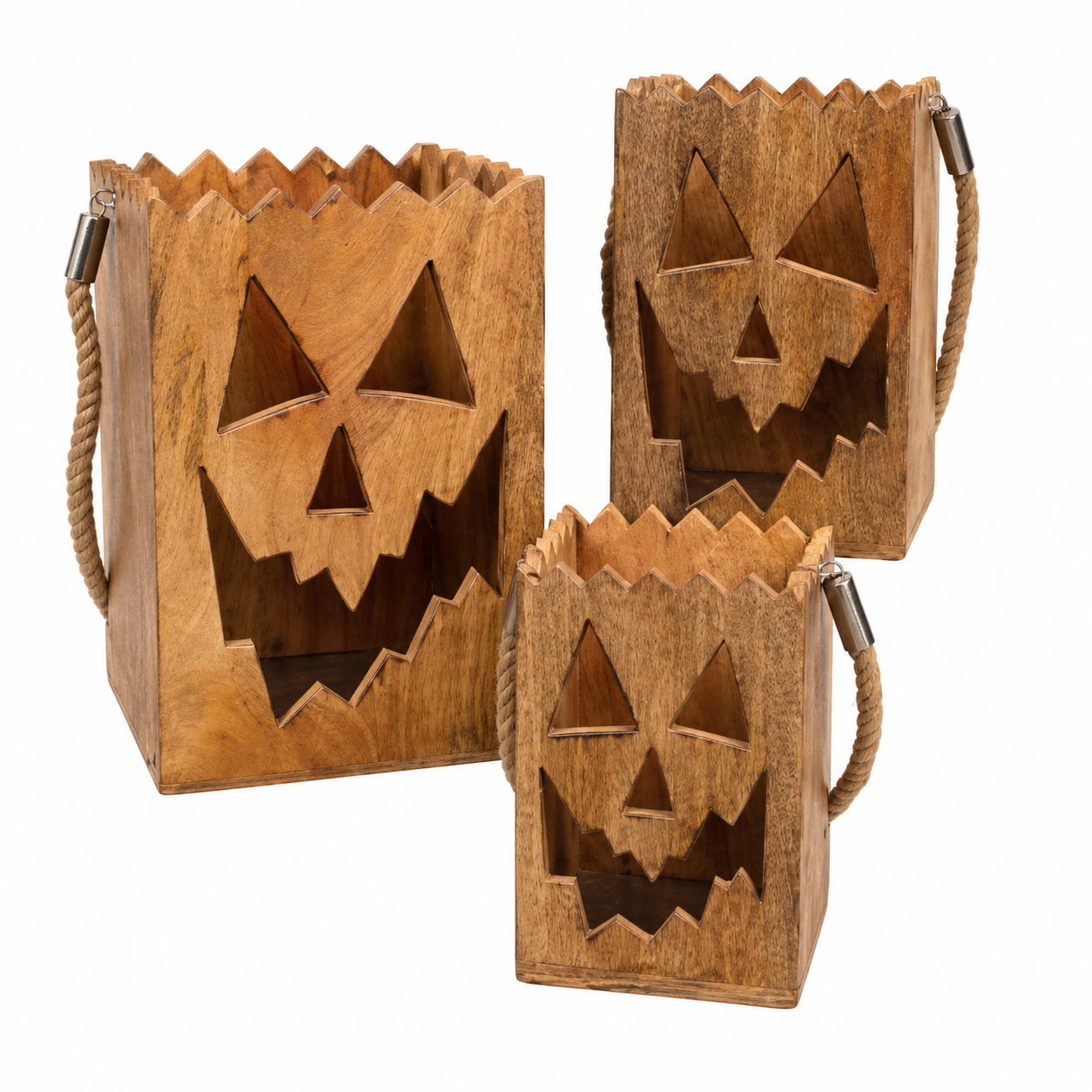 Set of three natural wood jack o lantern luminaries with cutout pumpkin faces and rope handles