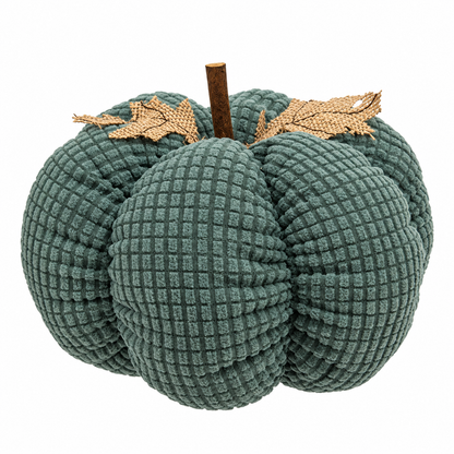 A textured, ribbed fabric decorative pumpkin in a muted sage green color, featuring a brown stem and two gold-toned leaf accents, set against a plain white background.
