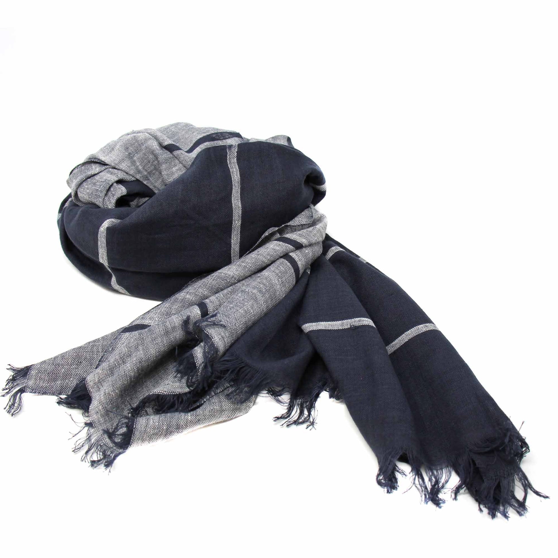 Hand-printed black and gray cotton scarf with fringe, displayed on a neutral background