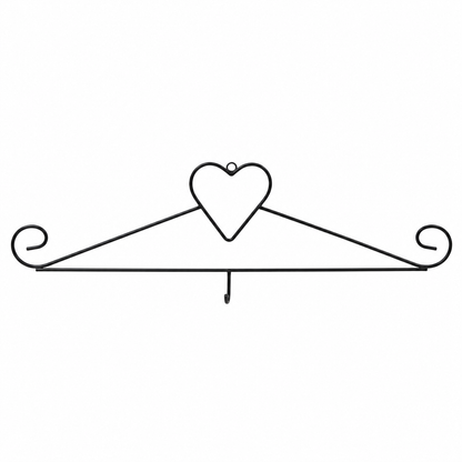 Black metal wall hook with a heart-shaped top and scrolled ends on a plain white background.
