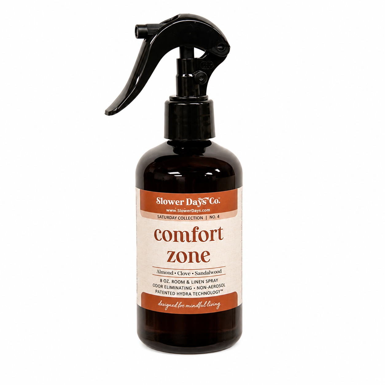 Amber room and linen spray bottle with black trigger sprayer and Comfort Zone label on a clean white background.