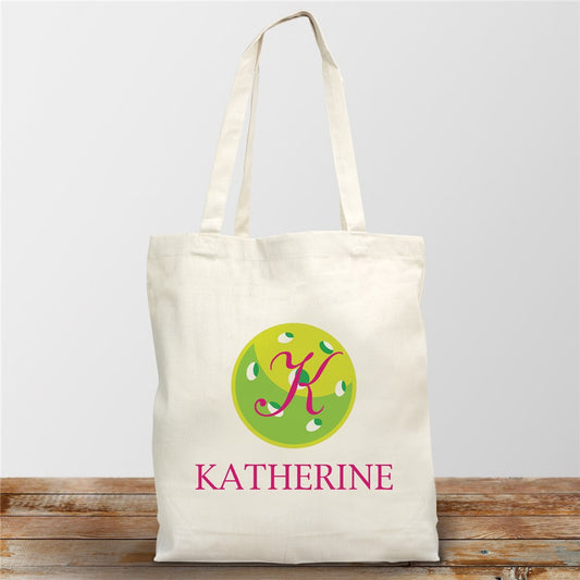 Personalized pickleball tote bag with initial and name in black print on natural cotton fabric