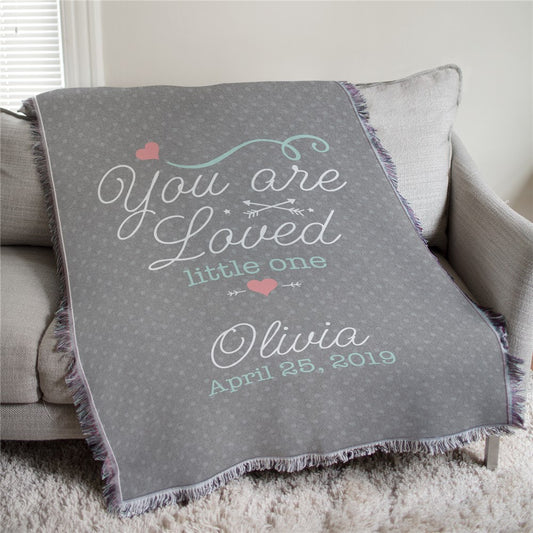 Woven baby girl afghan throw with pink and floral accents, personalized with name and birth date