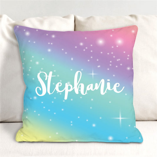 Personalized rainbow name throw pillow with white backing, available in two sizes