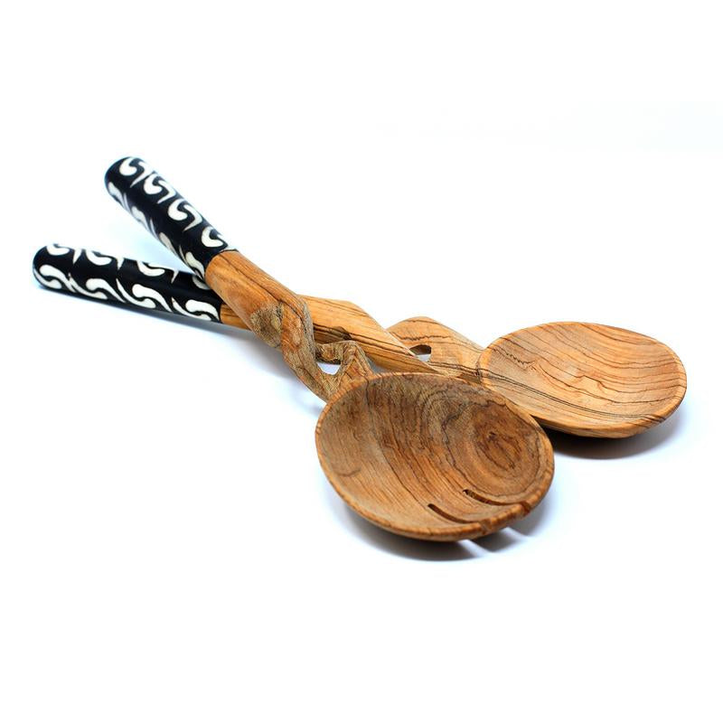 Sustainable olive wood kitchen utensils, handcarved in Kenya with unique artisan detailing.