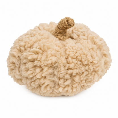 A plush decorative pumpkin with a textured, curly sherpa-like body in a warm beige color and a twisted jute stem, isolated on a white background.