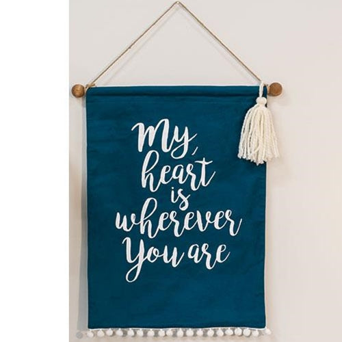 Teal fabric wall hanging with white text and tassel, romantic message home decor