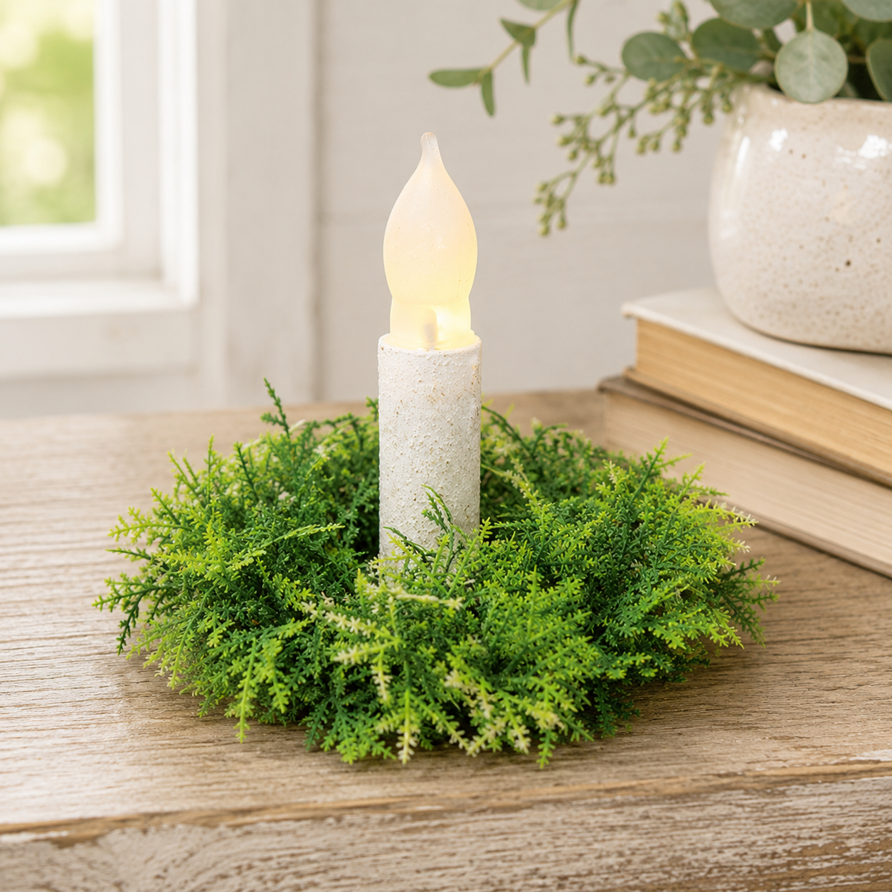 Forest Moss green candle ring with dense leafy branches in layered light and dark green tones surrounding the open center.