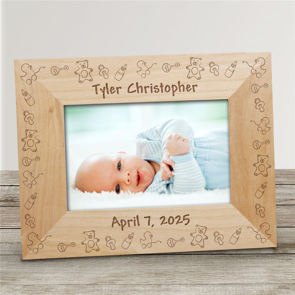 Personalized wooden baby picture frame with engraved baby toy design and name and date customization