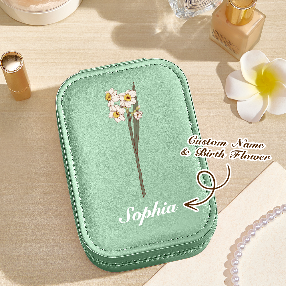 A top view of the green version of the personalized jewelry box, with a text overlay indicating that the name and birth flower are customizable for a personalized touch.