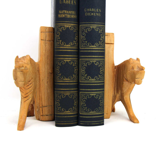 Pair of hand-carved lion bookends made from jacaranda wood