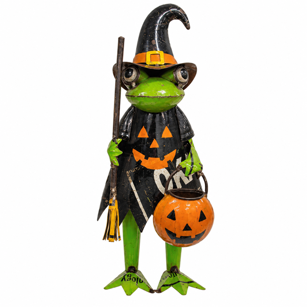 A decorative metal Halloween figurine of a green frog dressed as a witch, wearing a black pointed hat and cape with orange trim, holding a broom and an orange pumpkin bucket, on a plain white background.