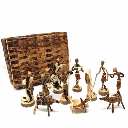 Handwoven banana fiber Nativity figures with warm natural tones, varying from light tan to deep brown.