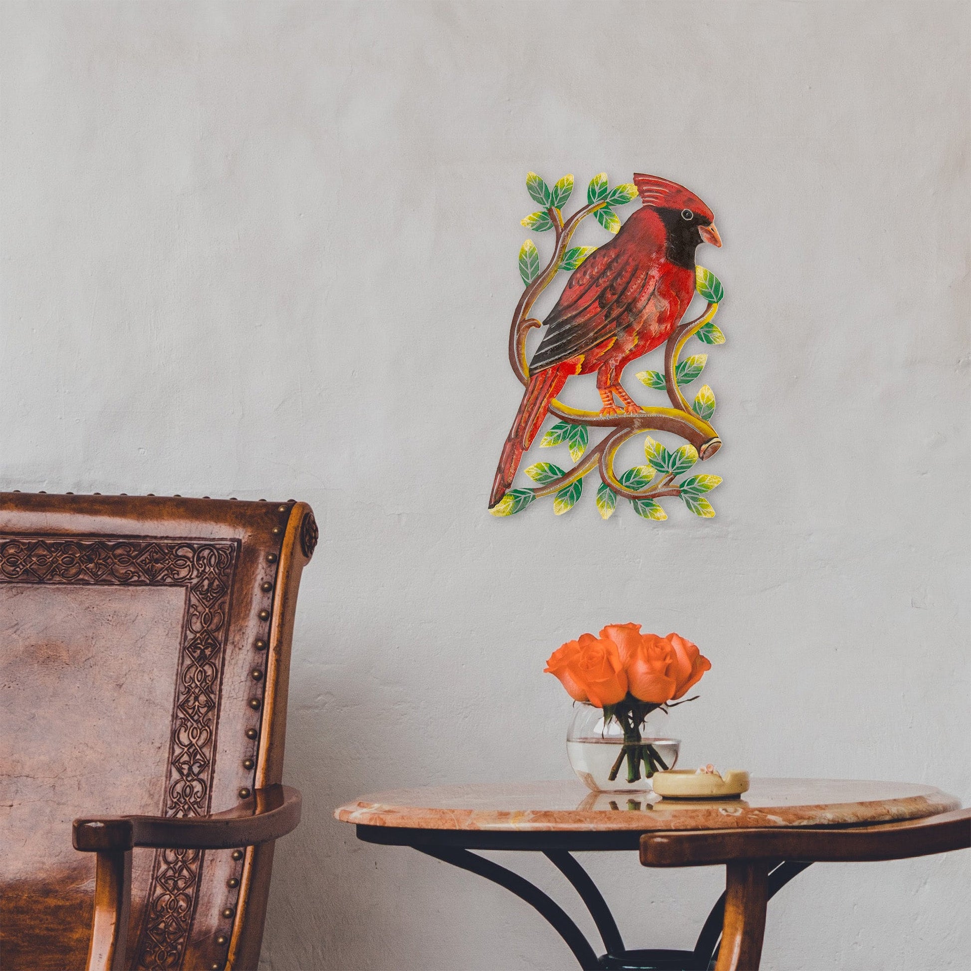 Cardinal and branch design on hand-cut and painted steel wall décor